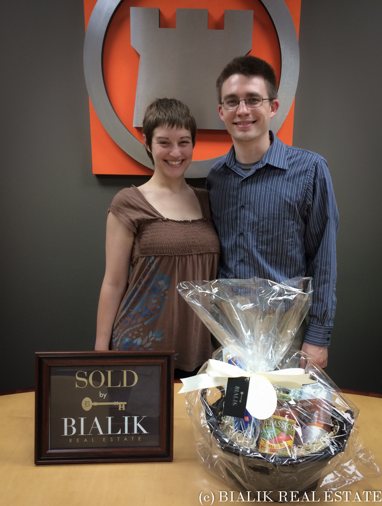 Ryan & Alycia celebrate their Coopersville home sold through Bialik Real Estate