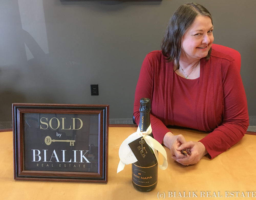 Julie closes on the sale of her Grand Rapids home, sold through Bialik Real Estate